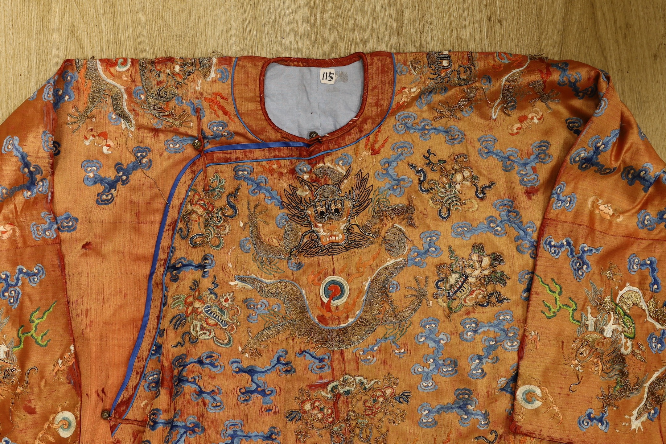 A Chinese embroidered silk dragon robe, late Qing Dynasty
